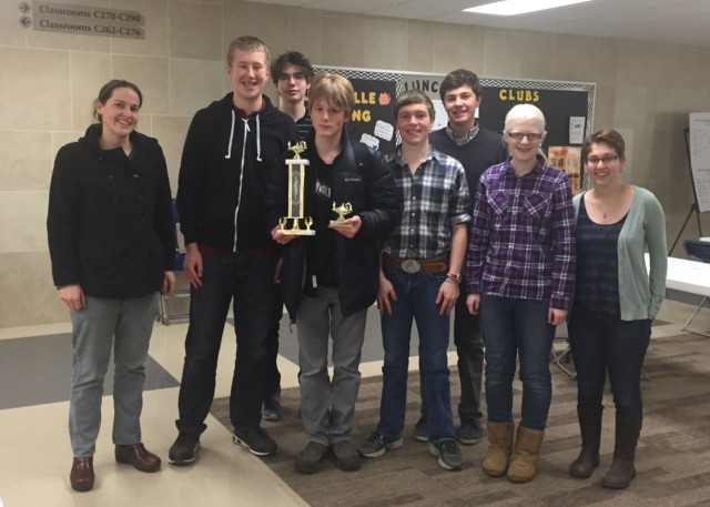 From left to right: Quiz Bowl adviser Andrew Bailey, freshman Peter Blanchfield, sophomore Paul Watkins, sophomore Cole Staples, sophomore Jack Indritz, junior Patrick Commers, sophomore Sarah Wheaton, junior Netta Kaplan.