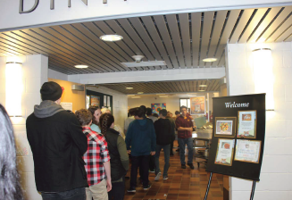 Students stand in line  for lunch on Meatless Monday  outside the Dining Hall. “I think it is a good idea for the environment; it’s a step in the right direction,” sophomore Maya Edstrom said. 