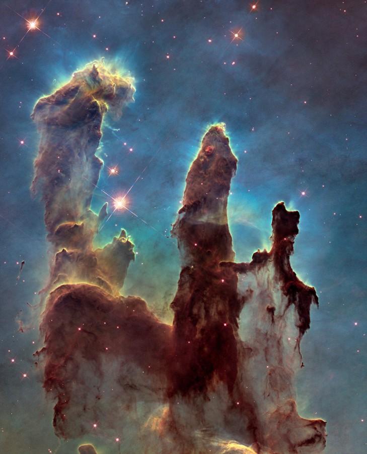 The an image of the iconic "Pillars of Creation" taken by the Hubble Space Telescope.