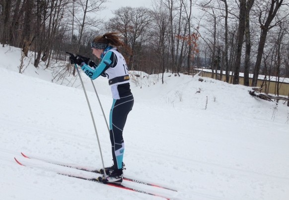 Senior Ellen McCarthy skis in Houghton, Michigan. “It is exciting to go and compete with my friends/teammates in a setting where everyone is serious about skiing,” McCarthy said.