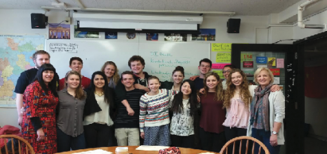 Students going on the German Exchange pose for a photo during one of the tutorial sessions that were held for students to learn more about the trip. “The most important thing for me is that I will end the trip with improved German speaking skills,“ senior Luke Bishop said. 