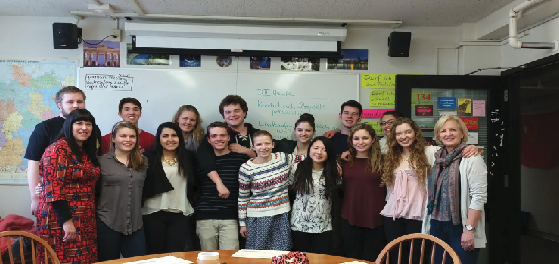 Students going on the German Exchange pose for a photo during one of the tutorial sessions that were held for students to learn more about the trip.  “The most important thing for me is that I will end the trip with improved German speaking skills,“  senior Luke Bishop said. 