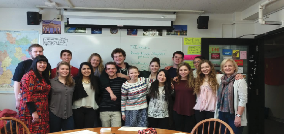 Students going on the German Exchange pose for a photo during one of the tutorial sessions that were held for students to learn more about the trip. “The most important thing for me is that I will end the trip with improved German speaking skills,“ senior Luke Bishop said.
