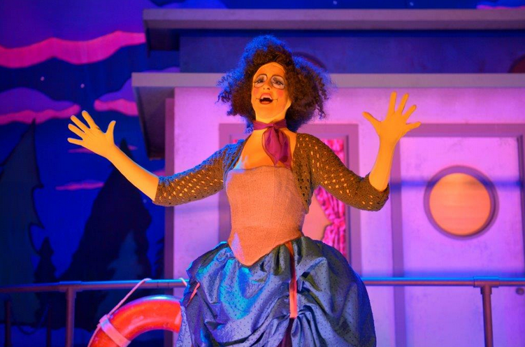 Andrea Krollenberg as Edna Krabappel narrates a bizarre theatrical reenactment of the famed Simpsons episode "Cape Feare," 80 years into the future. 