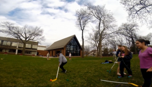 Freshman Olivia Williams Ridge, a player for the girls' hockey team, struggles with field hockey under drunk vision.