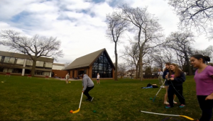 Freshman Olivia Williams Ridge, a player for the girls hockey team, struggles with field hockey under drunk vision.