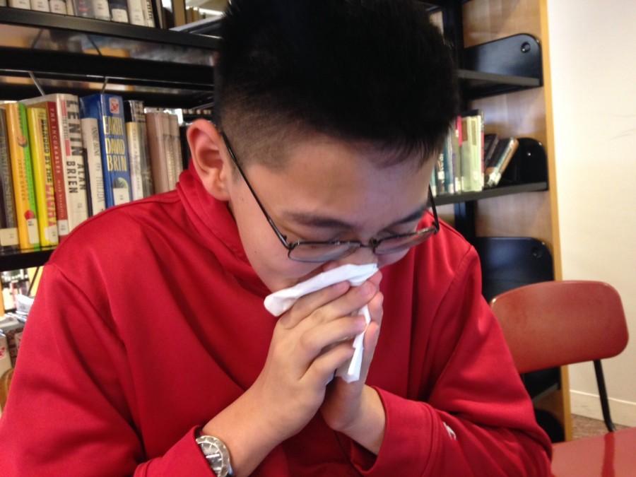 Sophomore Elliott Tong suffers from spring allergies.