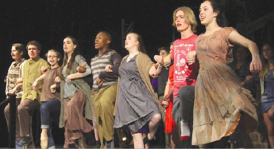 Spring cast of urinetown rehearse for the big show on May 15. One certainly wouldn’t want to live in the world where this musical is set, but every aspect of its production is sensational to experience. Pictured dancing, from left to right, are freshman John Gisselquist, senior Bill Naas, junior Maren Findlay, junior Taylor Rients, senior Dozie Nwaneri, junior Nissa Rolf, junior Caswell Burr, and freshman Maya Threstha.