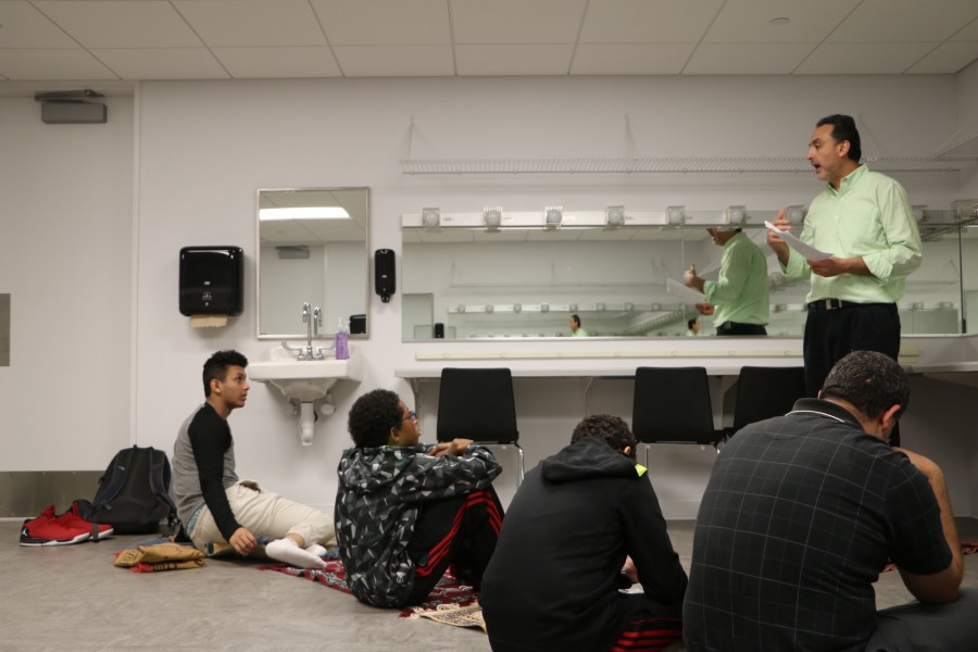 Students participating in the Friday prayer gather in the Huss Center's makeup studio every week. "More people showed up than I imagined...I hope it continues to be a place for students to pray," sophomore Adnan Askari said. 