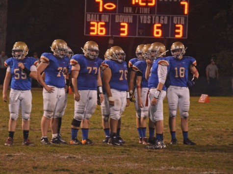 The Wolfpack offense huddles up before a key third down in the third quarter. The offense had many opportunities inside the Mahtomedi 30 but were only able to convert once.