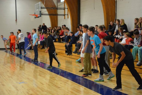 Team members line up to begin another round of the tournament.