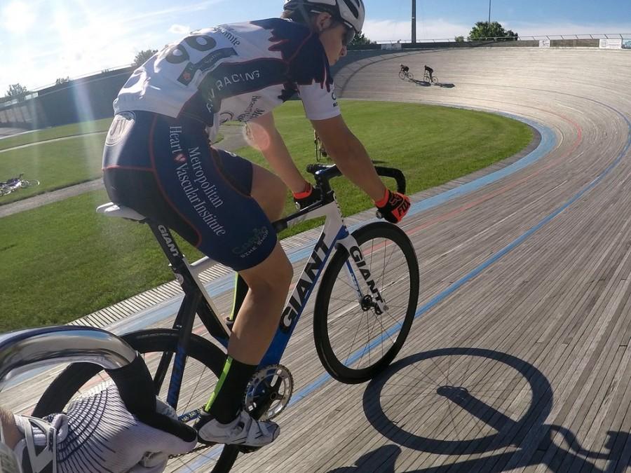 Freshman Peter Moore barrels around a track.