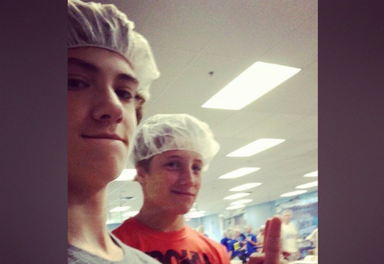 Juniors Weston Lombard and Jack Sullivan pose for a selfie while volunteering at Feed My Starving Children. Its always an amazing feeling seeing the total number of meals provided to the people in need, Lombard said. 