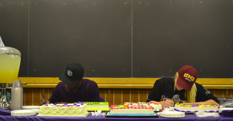 Seniors Dalante Peyton and Catherine Johnson sign their Nation Letter of Intent on Nov. 11. Johnson will attend the University of Minnesota Duluth to play hockey and Peyton will attend Winona State University to play basketball. Im honored and privileged...Go Bulldogs! Johnson said. 