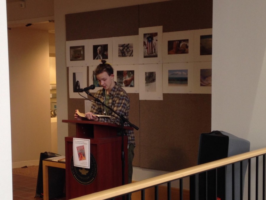 Sophomore Ben Atmore reads The Adventures of Sherlock Holmes in the Summit Center.
