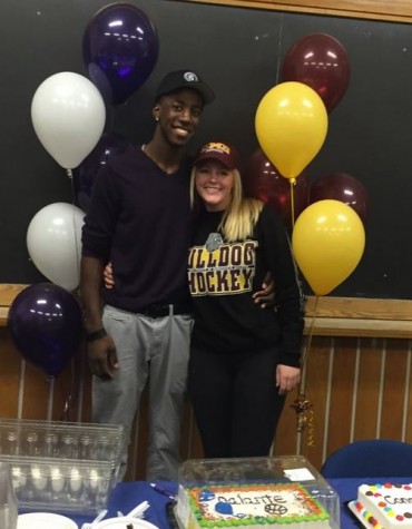 Seniors Dalante Peyton and Catherine Johnson sign their Nation Letter of Intent on Nov. 11. Johnson will attend the University of Minnesota Duluth to play hockey and Peyton will attend Winona State University to play basketball. "I'm honored and privileged...Go Bulldogs!" Johnson said. 