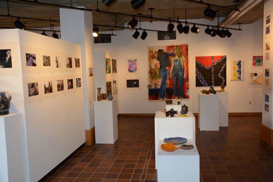 The Fine Arts department faculty spend countless hours working on putting up the art exhibition. Work from every student who has participated in either the first semester or trimester has a piece of work in the show.
