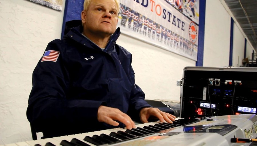 Hockey organist Russel Ebnet motivates with music