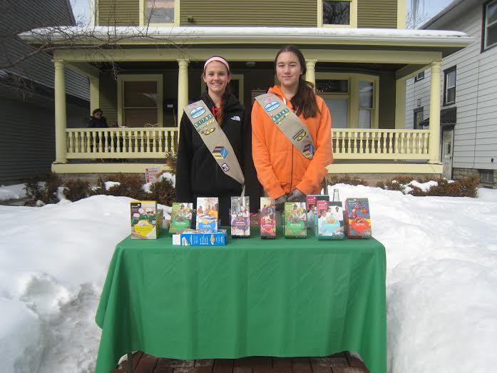 Juniors Clare Tipler and Sammie Bluhm sell girl scout cookies on Grand Ave. I have been a girl scout since I was five years old. To me, being one means being able to help people and do good and give back to your community, Bluhm said.