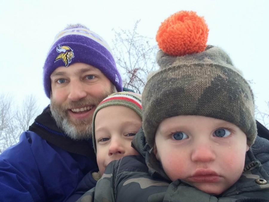 Upper School History teacher Jon Peterson takes a selfie while on a sled with his children. I hadnt been sledding since I was 13 and so now Ive been sledding again and I love it, I love sledding, Peterson said. 