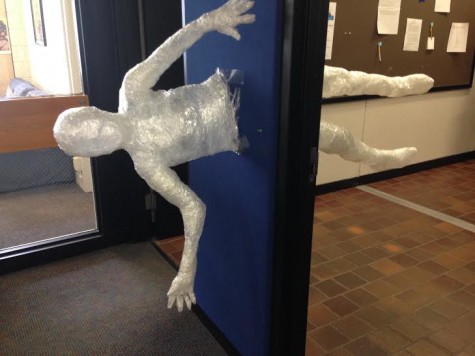 This tape sculpture is sliced in half by a wall near Dean Delgado's office.
