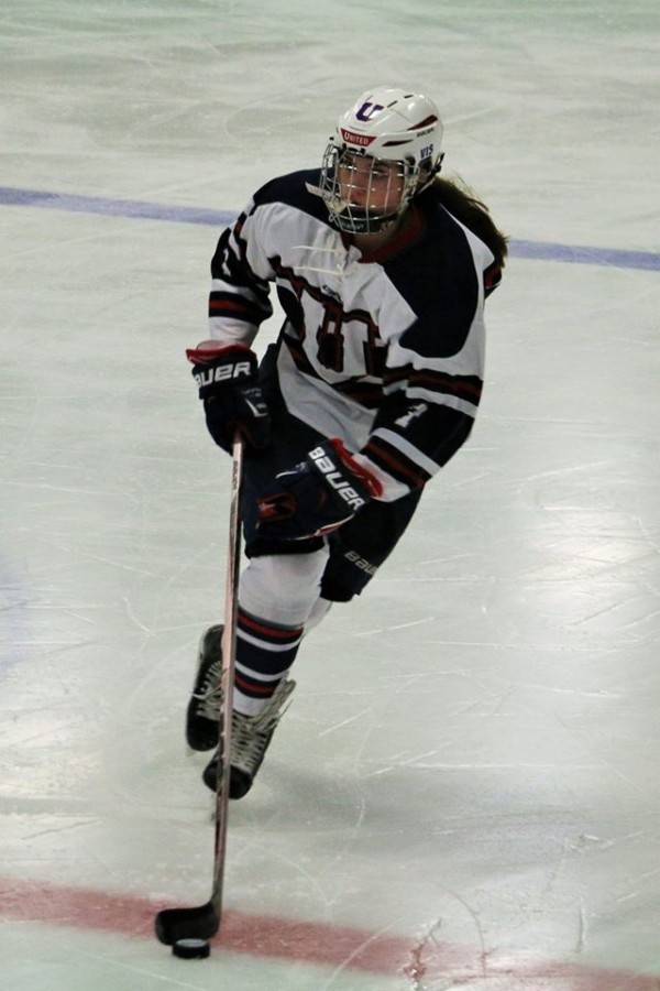 Senior Sena Hanson walks through the neutral zone to get the offensive attack started.  Hanson got one assist on the net on the second goal of the game. 