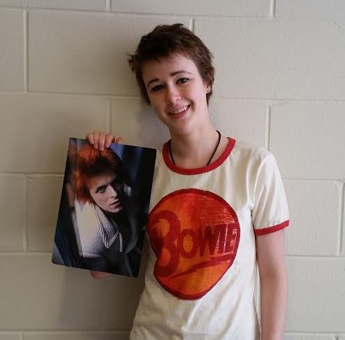 Senior Alice Tibbetts hold some of David Bowie memorabilia. David Bowie passed away on Jan. 10, at the age of 69. 