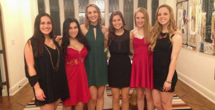 Seniors Dara Singh, Emilee Skadron, Cloe Wilkens, Rachel Hotvedt, and Claire Ristau pose for a picture before the 2015 Valentine's Dance. "[The dance] is going to be a good time," Wilkens said. 