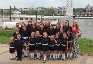 Sophomore LIillian Pettigrew stand with other members of her Irish dance school, Mactir academy.
