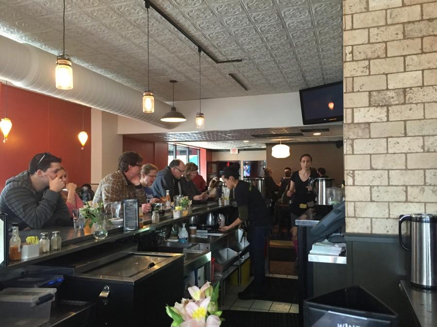 Customers can enjoy Colossal's made-from-scratch menu at tables or counter.