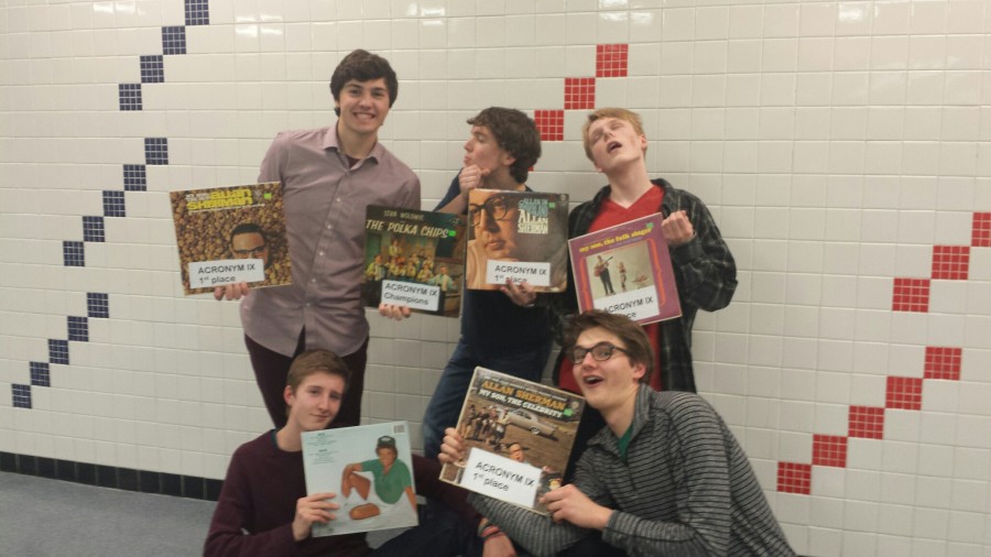 The Quiz Bowl teams mimic the images on their trophies. (Top from left) Patrick Commers, Jack Indritz, Cole Staples. (Bottom from left) Ewan Lang, Peter Schavee.