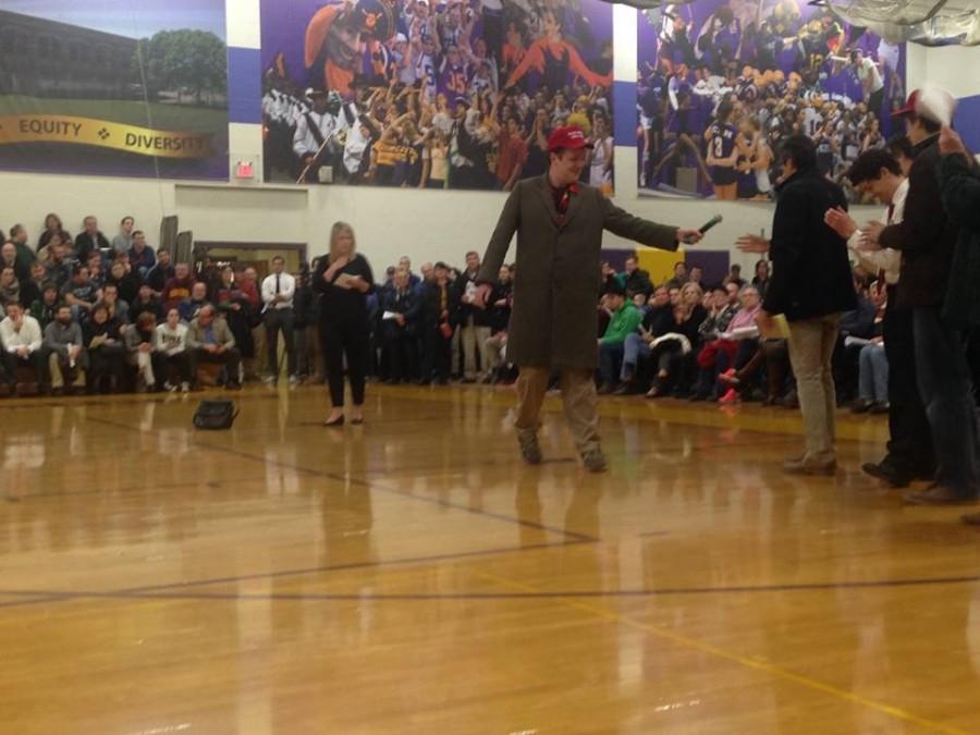 A St. Paul citizen passes off the microphone to the next speaker at the Republican Party caucus at Cretin Derham High School on March 1. Caucus participants were given the chance to address the public advocating for their preferred candidate before ballots were cast. 