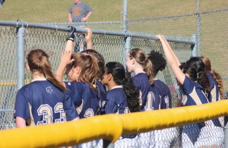 Members of numerous sports teams, including softball, begin preparing for another year of competition. 