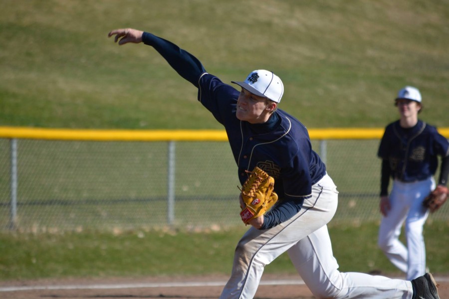 Junior Emerson Egly deals a pitch in the first inning of four solid innings of work where the Spartans gave up three runs, all coming in the first inning.