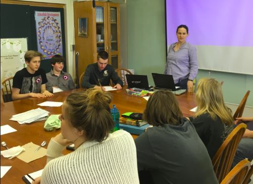 US Biology teacher Andrea Bailey talks with students in preparation for the Tanzania trip. "[We will be] doing things we do in class in a much more exotic locale," she said.