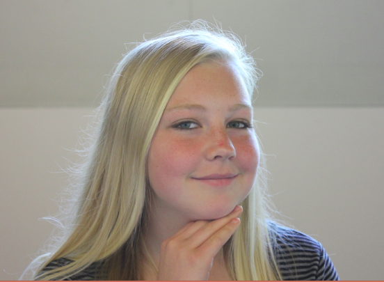 Freshman Emma Sampson  likes her new free periods: "It gives me time to relax and talk with friends. I like that I can go other places too." 