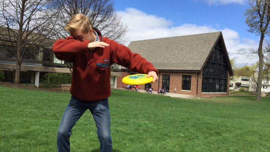 Senior Cas Burr dabs with a Frisbee. “Ultimate [Frisbee] is a really good team building sport and at the same time, a very good workout, Burr said.