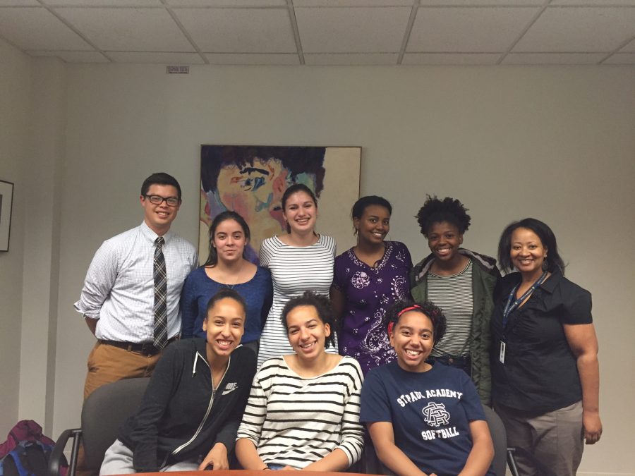 Girls involved in the Black and Brown Girls Affinity Group with Upper school History teacher Ryan Oto and K-12 Diversity Dean Karen Dye.