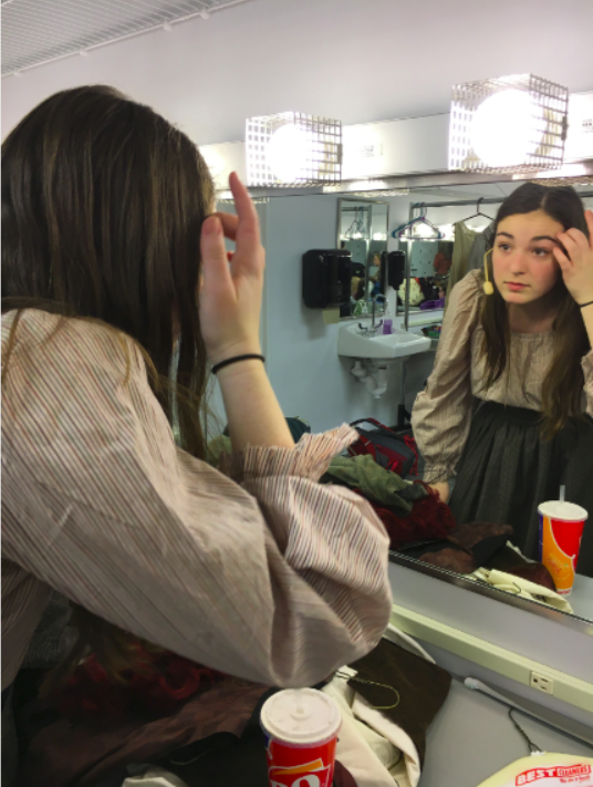 Costume and makeup changes take place in the makeup and dressing rooms in between scenes. 