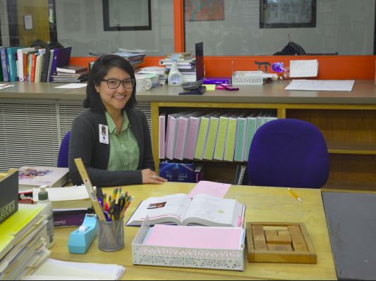 US mathematics teacher Beatrice White sits at her desk in the math wing. Im looking forward to taking on new ideas but also sharing them with people who Ive worked with here and hearing what theyre working on as well, White said.