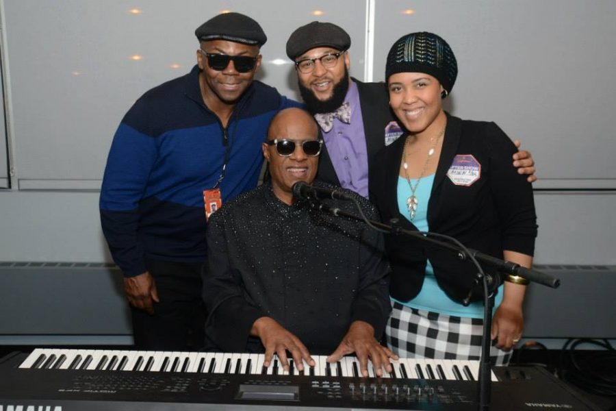 College counseling assistant Aja Parham meets world-famous singer Stevie Wonder. Submitted Photo: