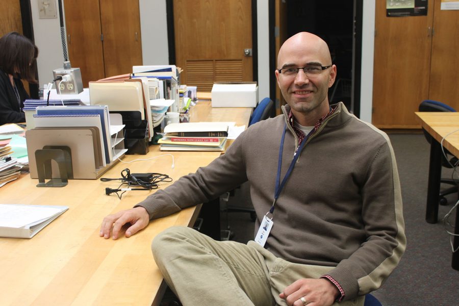 . UPPER SCHOOL MATHEMATICS TEACHER JOE WARD settles into the math department. “I’m most excited to learn about and become a part of the culture of the school,” Ward said.