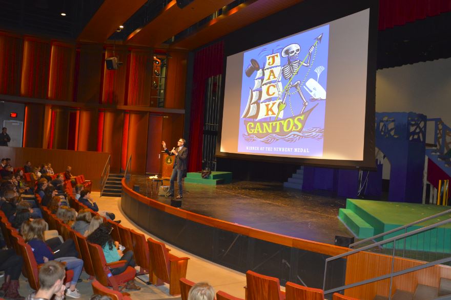 Author Jack Gantos spoke at the BookFest kickoff assembly on Nov. 15. "I didn't get started by thinking that the good stuff happens to someone else. I got started writing good books because I thought 'you know what the world I live in, every moment of it, something interesting is happening to me," Gantos said. 