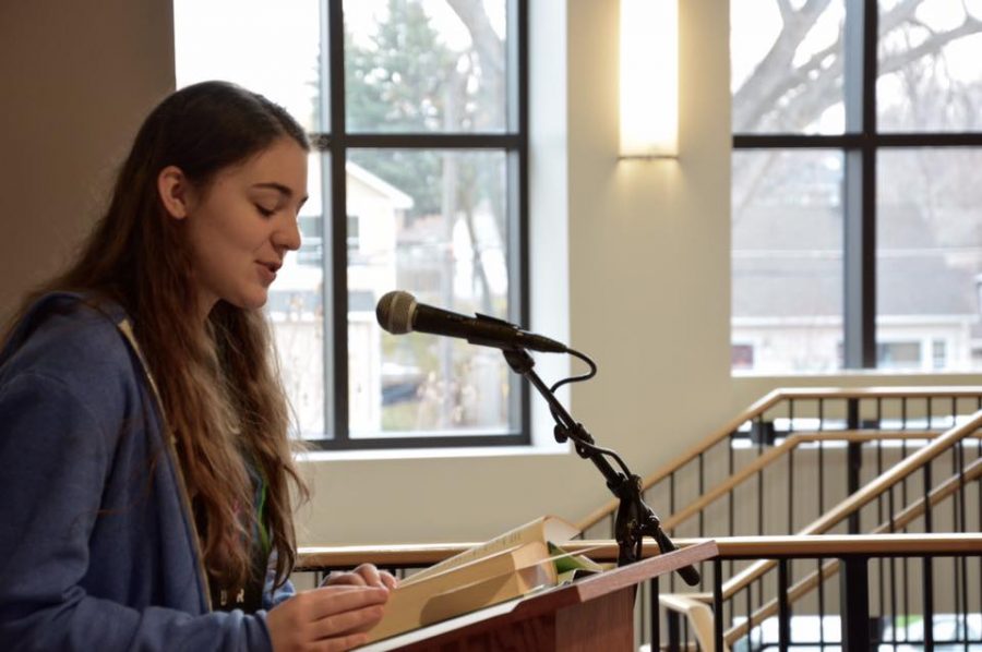 Senior Mary Grant participates in the Book Fest marathon reading on Nov. 17 in the Summit Center. “It was great. I was really happy because this book is hilarious to me,” Grant said.