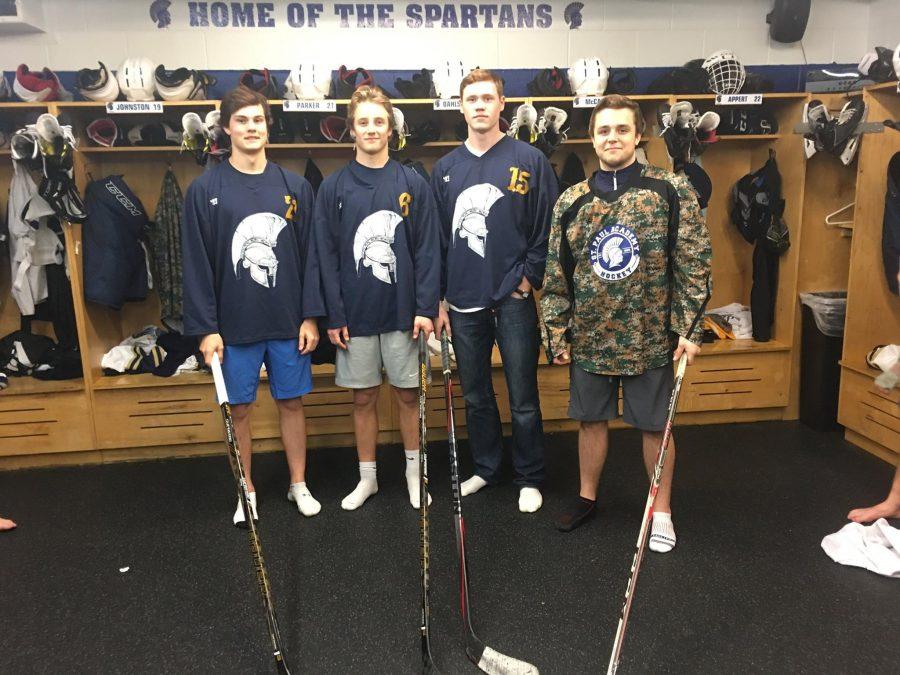 The Boys Varsity Hockey team is deeply rooted with different traditions and celebrations. More than just a sport, to some players it is a lifestyle. Senior Jack Sullivan has been playing hockey since he was little.  “I live for hockey, I love it,” Sullivan said, “since I was young, I’ve been playing hockey with my Dad at a rink near my house.” This is senior Dominic Picciano’s first year on the team, where he already feels comfortable.  “We’re just a band of brothers,” said Picciano.  	To get ready for each game, one of the team's traditions is a cheer they shout out in the locker room while they get prepared.  “We have a little chant we do before every game. We are a team, we are excellent, we are together, we are champions,” senior Weston Lombard said.  This chant helps the team to get ready mentally before they play a game.  Music is another way the team gets excited.  “My pump up song is ‘Champion’ by Kanye West because we’re all champions,” said Lombard.  	Winning a game is rewarding, but the celebration is where lots of the enjoyment happens.  “We celebrate a win by a dance party, team showers, and going out to eat afterwards,” senior Jack Sullivan said.  High spirits and plenty of fun help fuel this team onto its next game.  	The team's aspirations this year are high, coming off of a state run the previous season.  “We want to win state, win the tournament,” Lombard said.  After a successful season just a year ago, the boys are looking to cap off their high school careers with a win at state. 