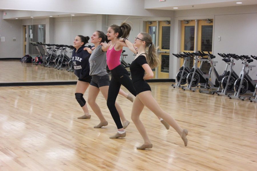 The dance team this year has made larges changes. Unlike other sports teams, the team has combined with Minnehaha Academy for the first time this season, creating a larger team than they had previously. Because of the change, they also don’t have any captains for the first time in over five years. Since Minnehaha just started the team, as a whole they decided that they wouldn’t have captains, because it wouldn’t be completely fair.    Ninth grader Ellie Hoppe has been on the St. Paul Academy dance team for three consecutive years and was a captain of the team last year. The team was very small in their previous years which is why the team decided to combine with Minnehaha Academy, who had never had a school dance team before.    “Because we’re a co-op with Minnehaha and it’s their first year this year, it didn’t really seem fair that they didn’t have a chance to be a captain,” Hoppe said.    “Becoming a co-op made the team larger and people get there at different times now but practice hasn't really changed that much,” Hoppe said.   Ninth grader Annika Findlay was also previously on the team, sees the new change as a positive adjustment and a chance to make new friends. The team was also able to grow close quickly since it is so small and close-knit. They bond as a team easily and bonded by pulling pranks on eachother.    “This year we’re really into pulling pranks on eachother, generally I’d say that we’re pretty positive and supportive,” Hoppe said. “We’re also a little sassy,” Findlay added.   “[One of our pranks was] in our rehearsal space there's an equipment closet and one time a girl was running late and we all hid in there and we set up a phone on face time so that we could see what was happening and then we jumped out,” Hoppe said.   “We also told one girl that she didn't submit the costume form in time so she wouldn't be able to compete,” Hoppe said.   Hoppe and Findlay both agreed that their team members from Minnehaha are all really supportive and nice and fit right into their team’s environment. The team becomes closer by doing go around or just talking about their days as they stretch or warm up at the beginning of practices.   “I think we’ve made a lot of really good new friends just in the first couple of weeks. There aren’t very many of us, but we’re pretty close,” Findlay said     “With the Minnehaha girls I was personally a little bit nervous because we didn’t really know them [yet] and we didn’t really know how they’d act and stuff, but they’re all really nice,” Hoppe agreed. 