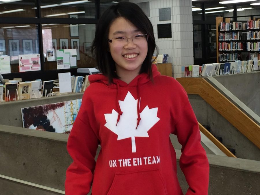 Both ninth grader Melissa Nie's passport and sweatshirt are Canadian. “Canada is colder and more hippie,” Nie said.