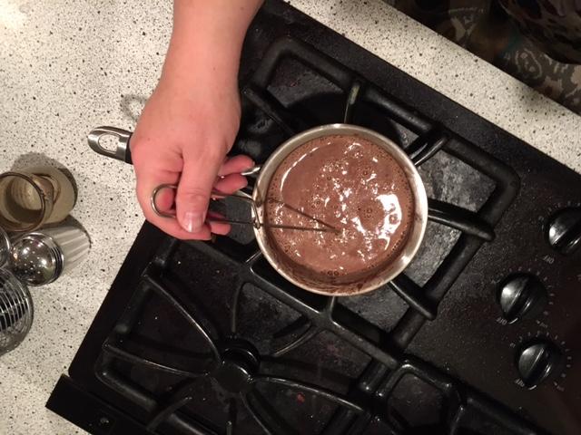 Remove from the heat and whisk until frothy. Pour into a cup and serve immediately.