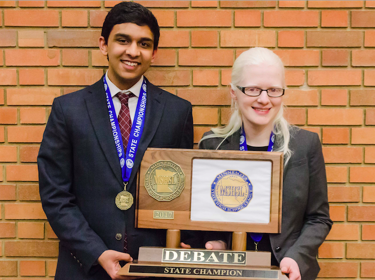Junior Adnan Askari and senior Sarah Wheaton hold the 2017 State Debate trophy, their second, in the MSHSL competition. knowing that we could still be good enough to meet [that expectation] feels good, Wheaton said.