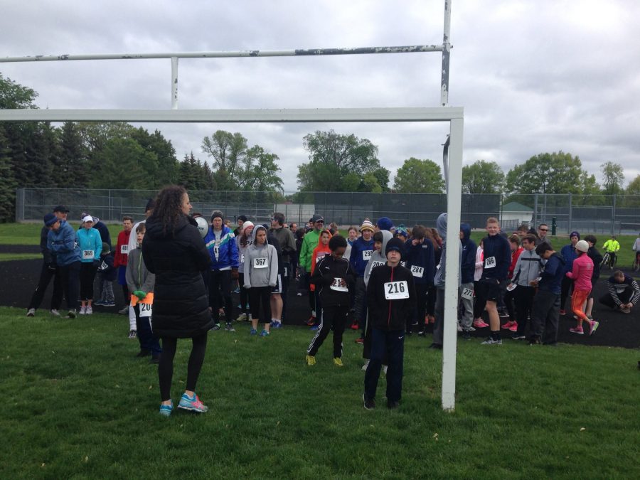 Anderson stands at the starting line of the SPA 5k run/ walk last year. 